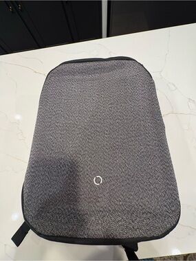 Sleek Men's Gray Minimalist Backpack with Subtle Ring Accent